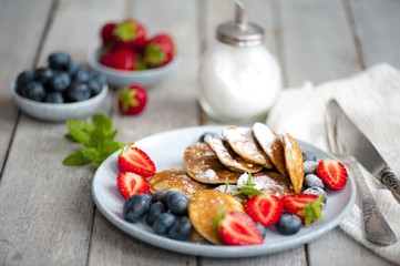 Traditional danish pancakes - ebelskivers with fresh berries