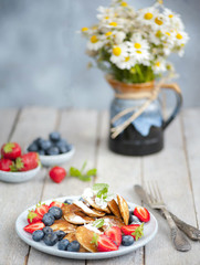 Traditional danish pancakes - ebelskivers with fresh berries