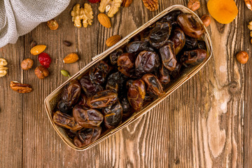 dates on wooden background