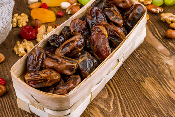 dates on wooden background