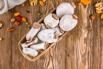 Dried persimmon on wooden background