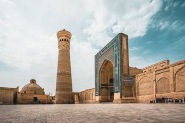 Poi Kalon Mosque and Minaret in Bukhara, Uzbekistan - obrazy, fototapety, plakaty