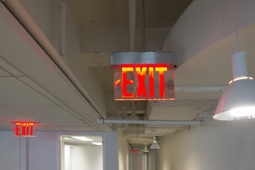 Modern exit sign red LED lights clear plexiglass 