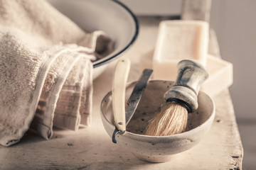 Antique tools for barber with brush, razor, soap