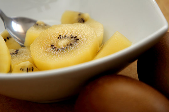 gold kiwi fruit in a dish