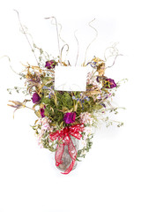 Dead and dried out gift bouquet of flowers in vase