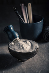 Vintage shave tools with grey soap, razor and brush