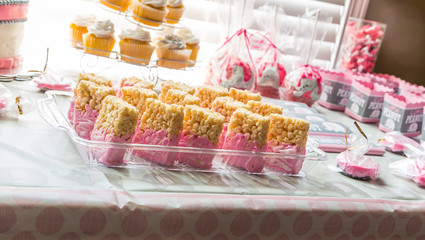 Rice Crispy Treat Close Up:  Rice crispy treat close up on display at a baby shower for an expected girl.
