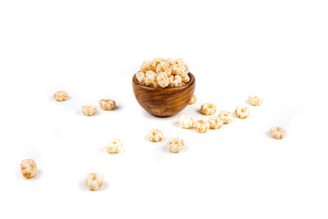 Piles of pale whole grain children's puffed cereal snack