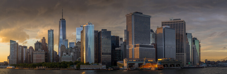 Panorama view of  NYC Lower Manhattan skyline in New York Harbor