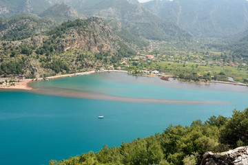 View over Orhaniye village and Kizkumu beach near Marmaris resort town in Turkey.