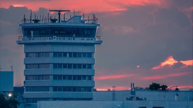 Air traffic radar control tower after thunderstorm at sunset. Time lapse