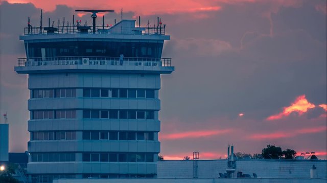 Air traffic radar control tower after thunderstorm at sunset. Time lapse. Zoom effect