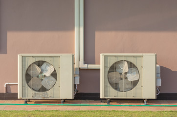 Air Compressors Installed on the side of the house.