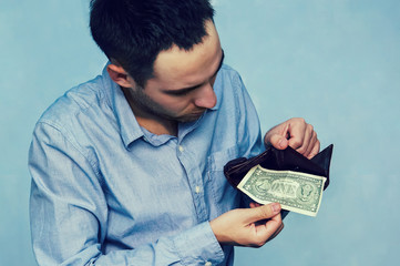 last one dollar money banknote in wallet,