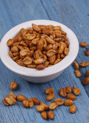 Closeup of roasted peanuts.