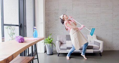 housewife dance happily and sing