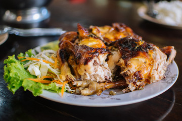 Grilled chicken with vegetables aside