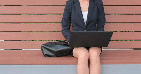 Close up of businesswoman work on notebook computer