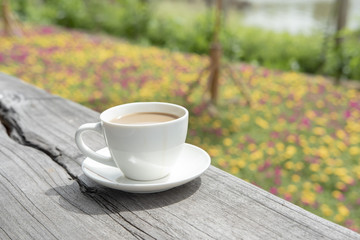 white ceramic coffee cup in the nature