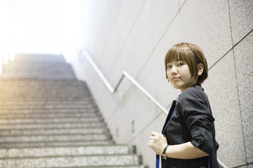 Portrait of a young smiling Japanese woman