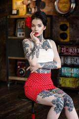 Beautiful girl dressed at pin-up style