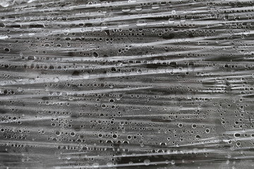 texture of a stretched film with water droplets background