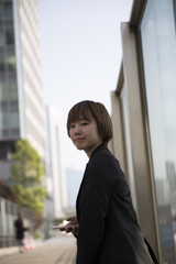 Fototapeta premium Portrait of a young smiling Japanese woman
