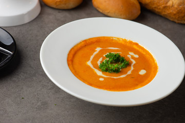 tomato soup on a bowl