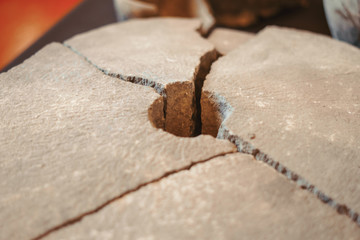 Center of the old grinding wheel or millstone