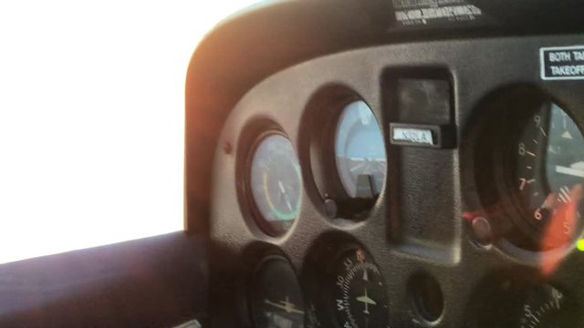 Cessna gauges backlit by sunset 4K