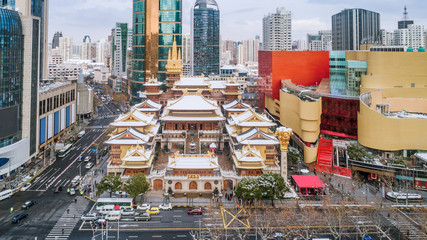 aerial view of downtown Shanghai near Jing An Temple and Nanjin Road after an unusual snowfall in the morning