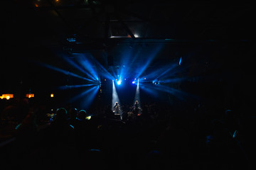 Fototapeta na wymiar Blue lights in a concert