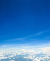 Papier Peint photo Lavable Ciel Beautiful view of blue sky above the white clouds from airplane window