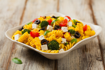 Salad with pasta and feta cheese