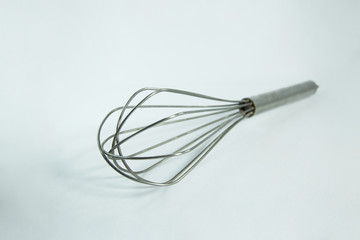 Obraz na płótnie Canvas eggs wire whisk object in kitchen