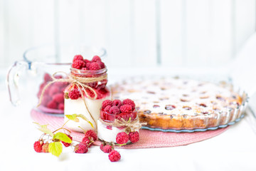 breakfasts, desserts. Yogurt with raspberry syrup and raspberry berries and raspberry pie
