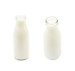 Glass bottle of milk isolated