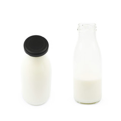 Glass bottle of milk isolated