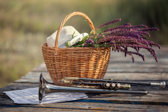 Basket, wild flowers, trumpet