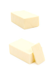 Slice block of butter isolated