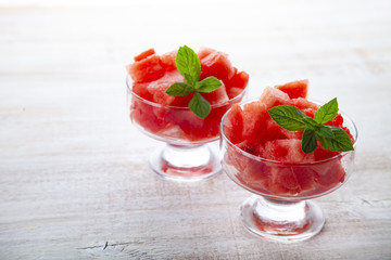 Pieces of watermelon and mint in a plate