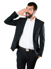 Fototapeta premium Handsome businessman listening something