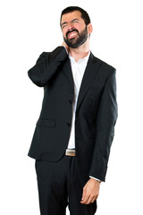 Handsome businessman with neck pain