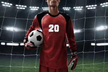 Foto op Canvas Soccer goalkeeper holding soccer ball © fotokitas