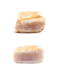 Semi-cooked chicken piece isolated