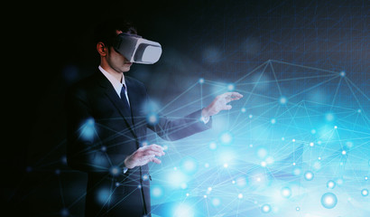 concept of a businessman in VR  working