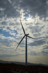 Silhouette of a California Windfarm Windmill