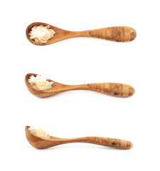 Wooden spoon of sauerkraut