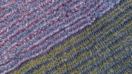 Fototapeta premium aerial view of plethora of shared bikes tangle on parking lot